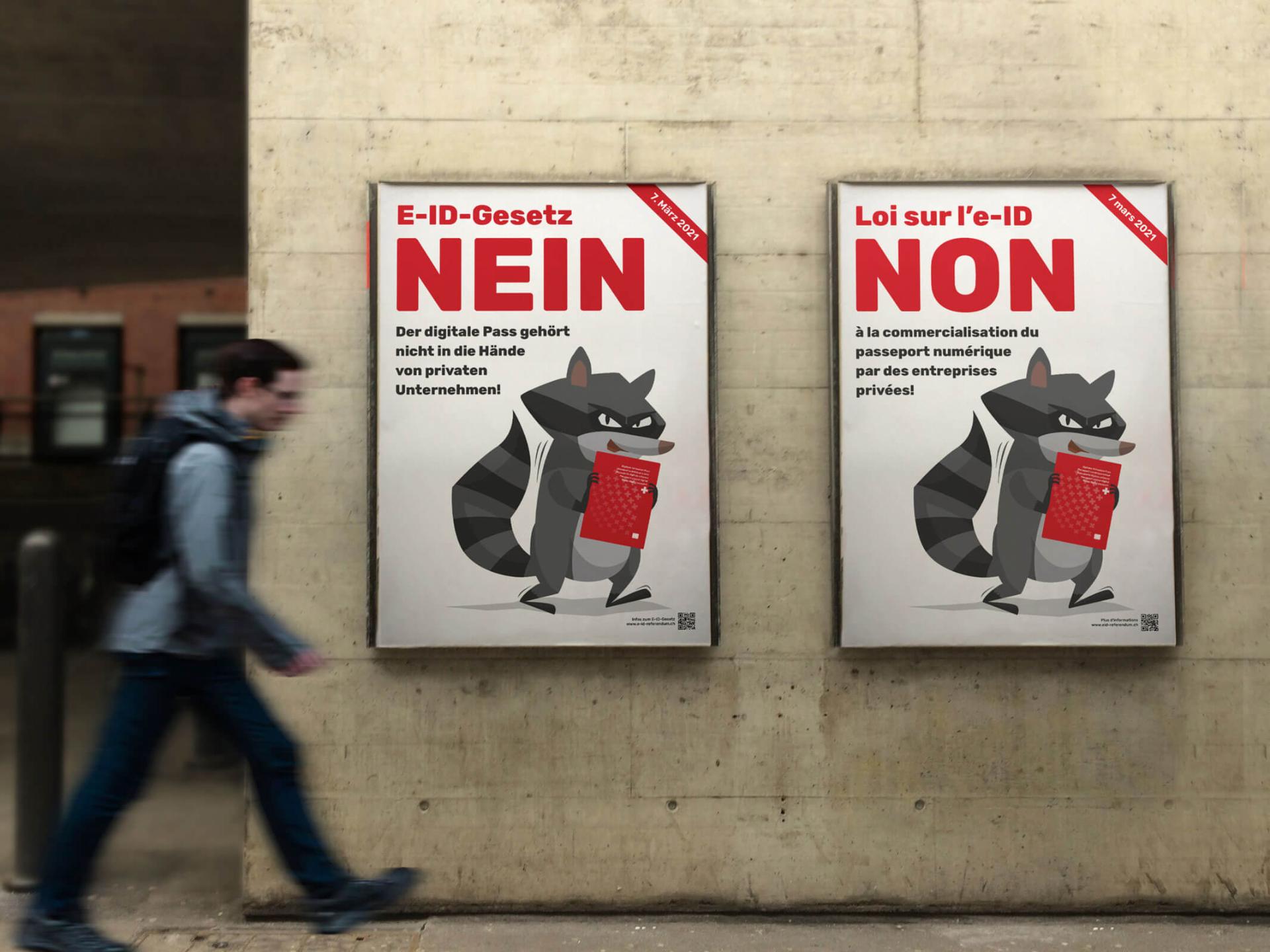 Eine Betonwand mit zwei Abstimmungsplakaten zum E-ID-Gesetz